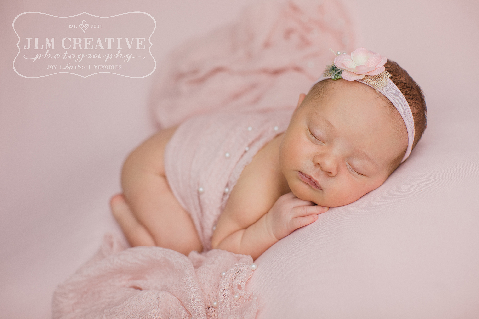 tummy pose baby girl pint flowers